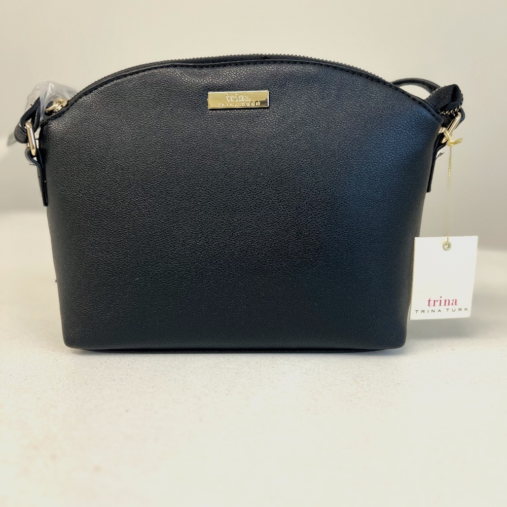 Tina Turk Hand Bag Black with Gold accents New with Tags